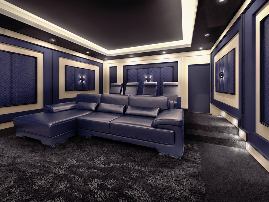 Blue and creme-colored home theater space with tiered seating, sconces, and overhead lighting. 